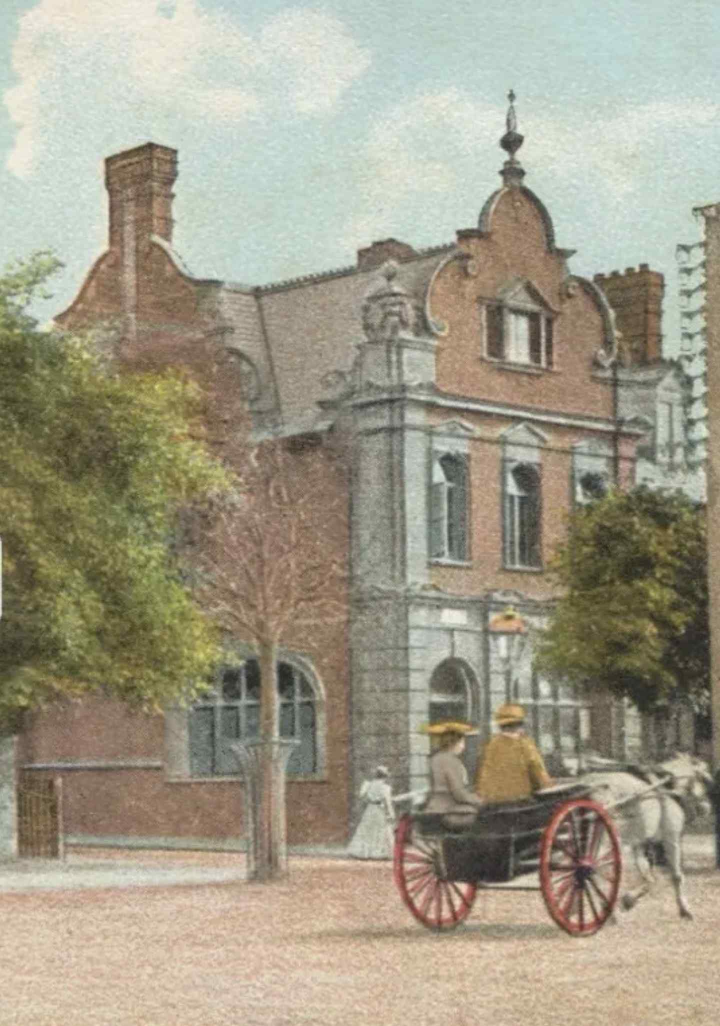 A hand coloured photograph of the front of the post office c1910.