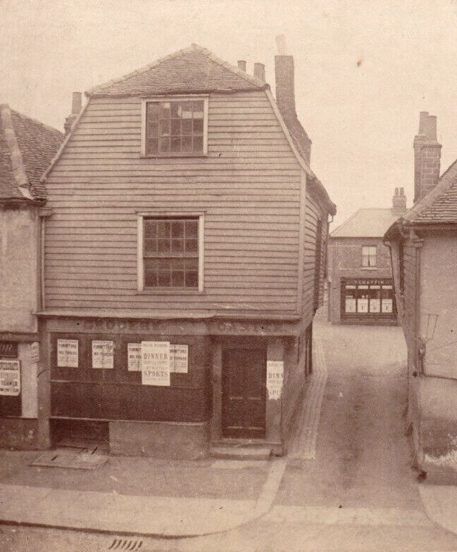 A photograph of Church House shortly before it was demolished, note how narrow the entry to Crown Street is.